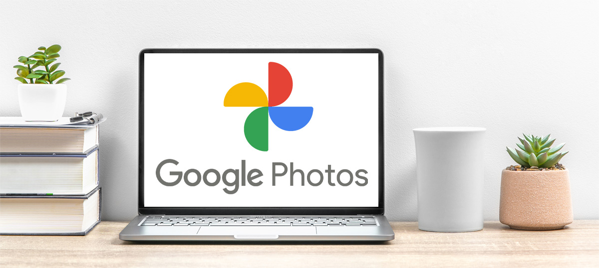 Laptop with Google Photos icon displayed.